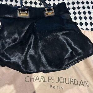 Charles Jourdan Black Interior with Gold Accents